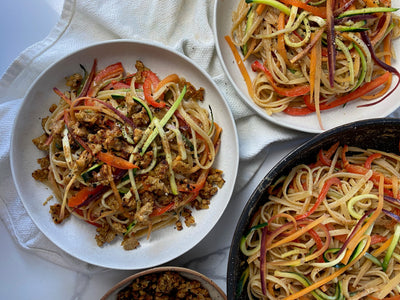 2. Spicy Almond Butter Rainbow Noodles with Tempeh Crumbles