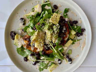 5. Black Bean Stuffed Sweet Potatoes with Chili Almond Butter Sauce